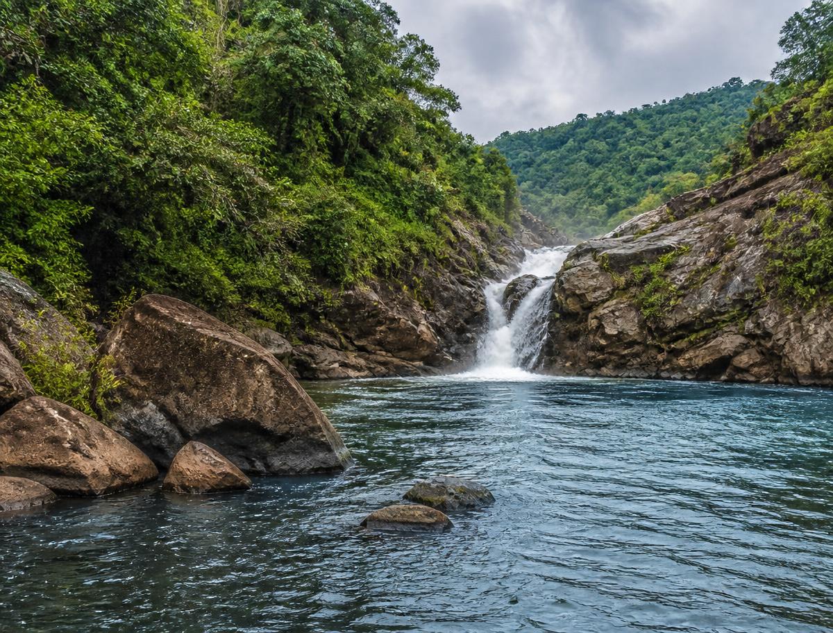 River gorge and waterfall in the ecotourism belt of the wider Malavalli region near the project