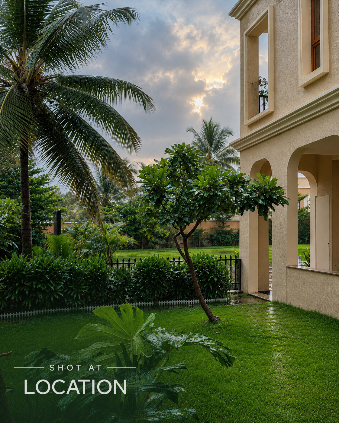 Landscaped garden courtyard beside a Project 3 Yelahanka villa at dusk