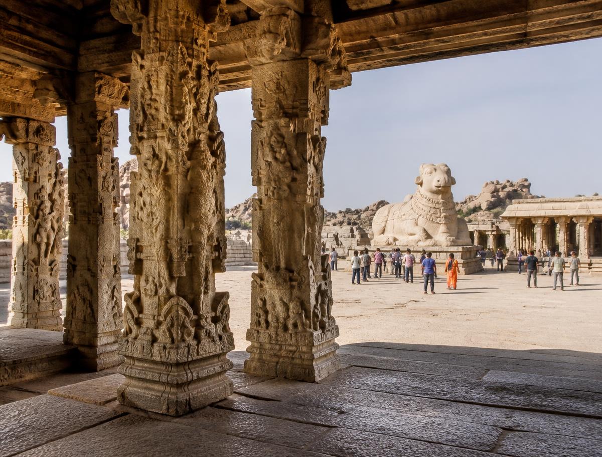 Carved granite pillars and the monolithic Nandi of the Vijayanagara-era Lepakshi temple near the project